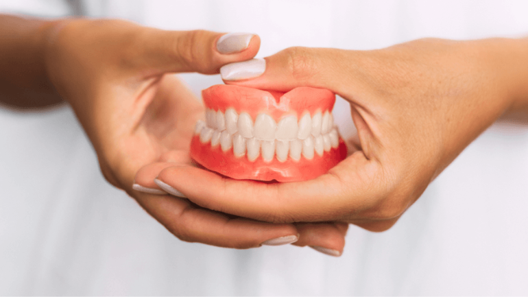 Everything You Need to Know About Dentures: Types, Care & Cost